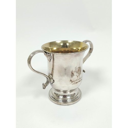 19 - Pair of early Sheffield plated two-handled cups with loop handles, crested, on inset mahogany bases,... 