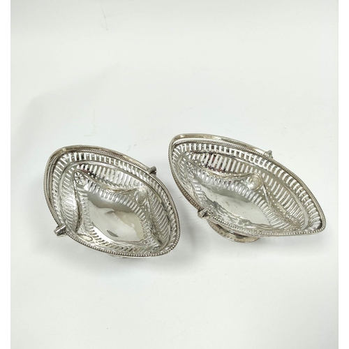 24 - Attractive pair of oval sweetmeat baskets of Neo Classical style, with pierced and embossed swags an... 