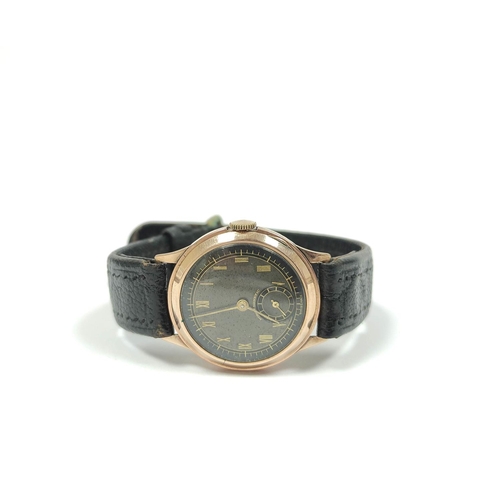 25 - Gent's Trebex watch with vertical Roman numerals on black, 1938, on strap, 30mm.