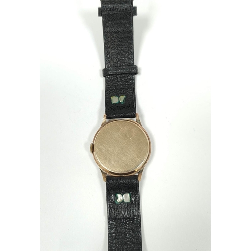 25 - Gent's Trebex watch with vertical Roman numerals on black, 1938, on strap, 30mm.
