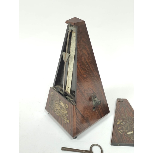 189 - Early Pacquet metronome, no. 2310, in rosewood pyramidal case, with inlaid brass and pearl musical t... 