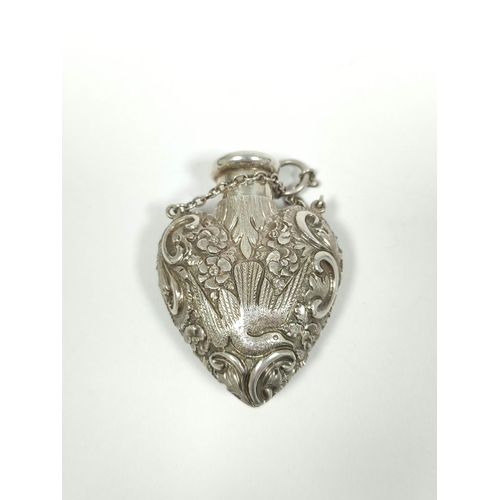 51 - S. Mordan, silver perfume flask of heart shape, embossed with flowers and birds, 1890, 59mm x 44mm.&... 