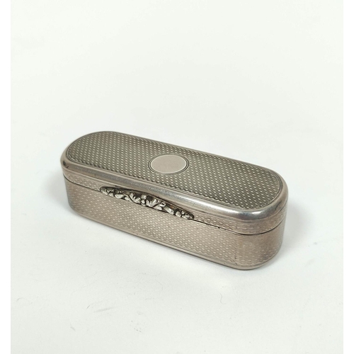 75 - Silver snuff box, rectangular with rounded ends, engine turned all over with chased thumb piece, by ... 