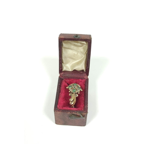 79 - Georgian gold ring with brilliant and rose diamonds and four emeralds with tiny locket on scrolls, 1... 