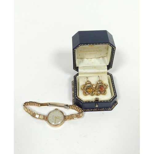 86 - Lady's Peerex 9ct gold watch on v.g. bracelet and a pair of cinquefoil earrings, each with a citrine... 