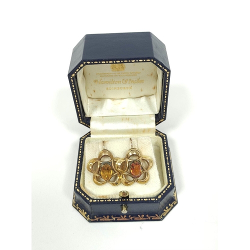 86 - Lady's Peerex 9ct gold watch on v.g. bracelet and a pair of cinquefoil earrings, each with a citrine... 