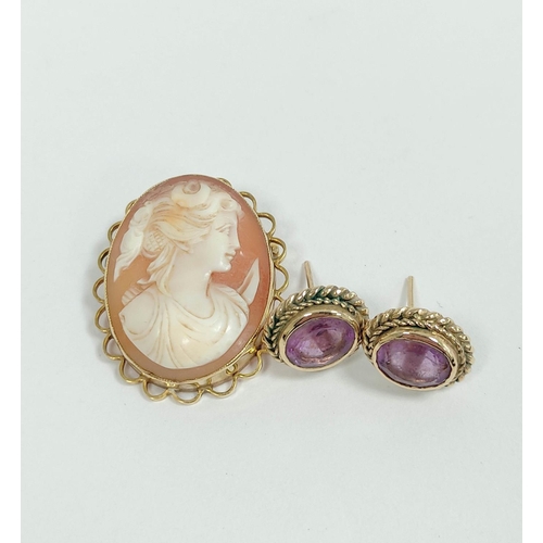 125 - Cameo brooch and a pair of amethyst earrings both 9ct gold. 