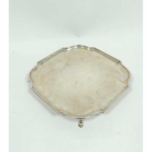 131 - Silver tray of shaped square form with bath border on pad feet, Sheffield 1931, 22cm, 465g / 14½oz.