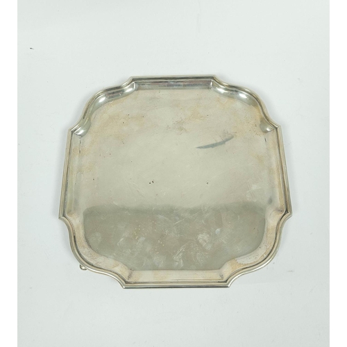 131 - Silver tray of shaped square form with bath border on pad feet, Sheffield 1931, 22cm, 465g / 14½oz.