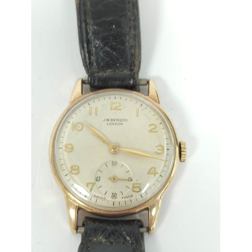 135 - Gent's 9ct gold watch for Benson, with silvered and gold dial, 1955, 31mm on strap.