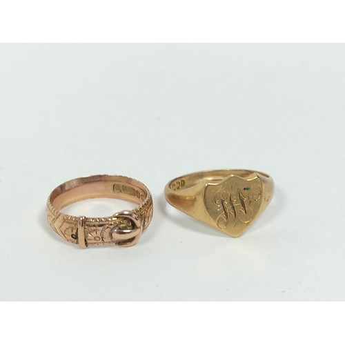 138 - 9ct gold buckle ring and a similar 18ct signet ring 9.8g. (2).