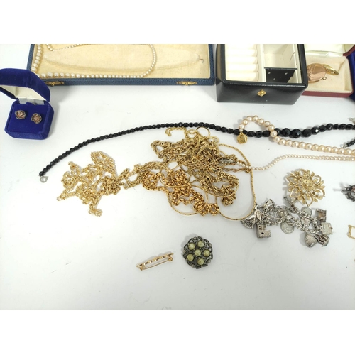 144 - A scarf pin, a back and front locket and a quantity of costume and other jewellery.