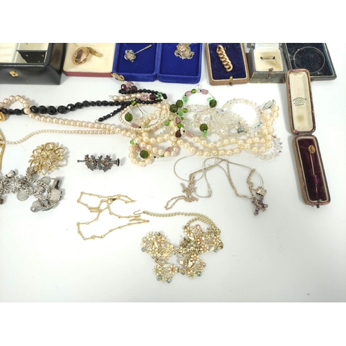 144 - A scarf pin, a back and front locket and a quantity of costume and other jewellery.