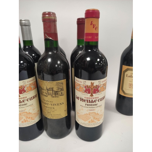 215 - Twelve bottles of French Bordeaux and red wines to include two bottles of Château Simard Saint-Emili... 