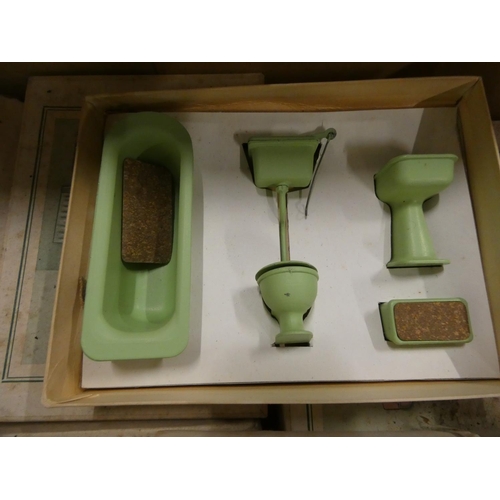 Antique doll's house porcelain bathroom suites.