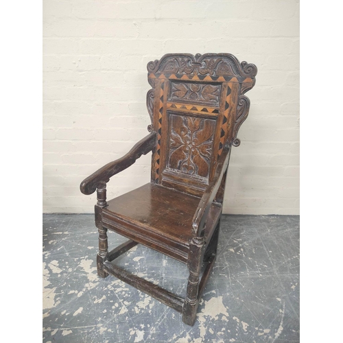 398 - Near pair 17th century oak panel back armchairs, West Yorkshire, the shaped top rails with carved an... 