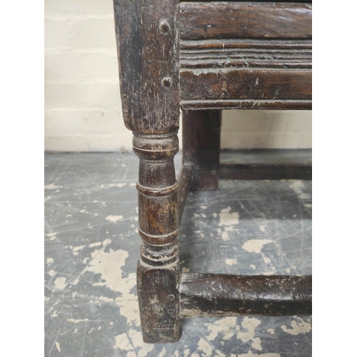 398 - Near pair 17th century oak panel back armchairs, West Yorkshire, the shaped top rails with carved an... 