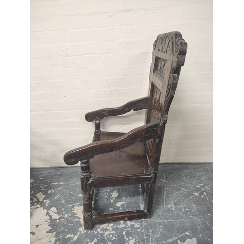 398 - Near pair 17th century oak panel back armchairs, West Yorkshire, the shaped top rails with carved an... 