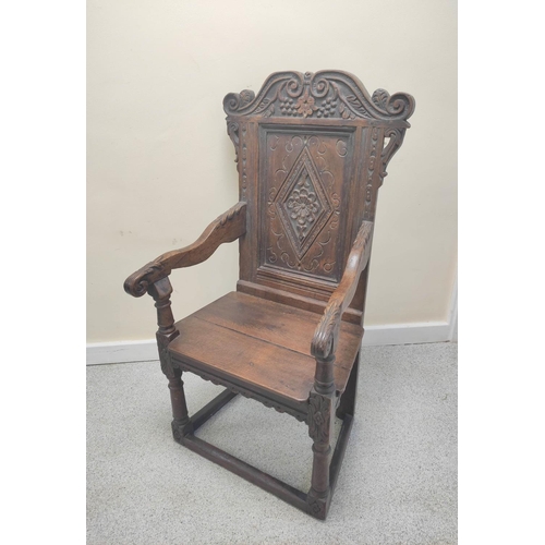 400 - 17th century and later oak wainscot armchair, North of England, the carved panelled back above shape... 