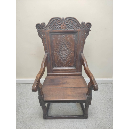 400 - 17th century and later oak wainscot armchair, North of England, the carved panelled back above shape... 