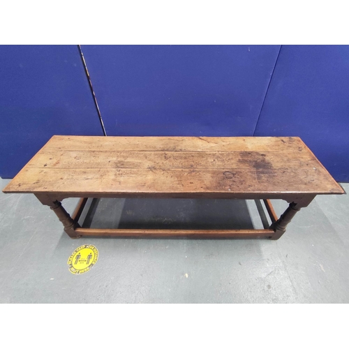 404 - 17th century style oak refectory table, with fixed plank top, above a carved frieze, raised on turne... 