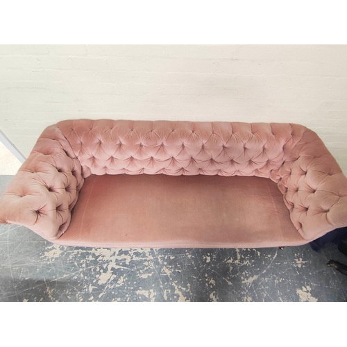 414 - Victorian Chesterfield style sofa upholstered in later pink button back velour, on mahogany turned s... 