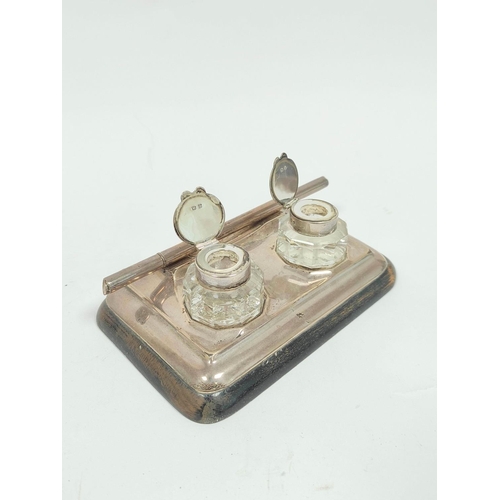 148 - Silver fronted inkstand, a pen and a photograph frame with oak easel back, for image 15cm x 10.5cm.&... 