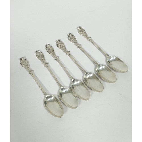 164 - Unusual set of six silver tea spoons, of good gauge, with scroll heels and scroll and grotesque mask... 