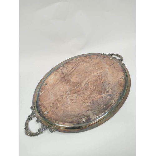 170 - E.p oval tea tray, engraved with scrolls and testimonial 1866, 72cm, over handles. 