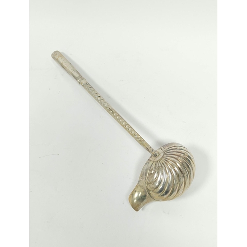 175 - East European silver ladle with scallop bowl and embossed stem, mid 19th century, marks not clear, 3... 