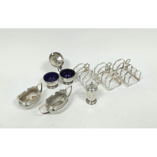 179 - Three silver individual toast racks and five condiments, approx. 280g / 9oz.