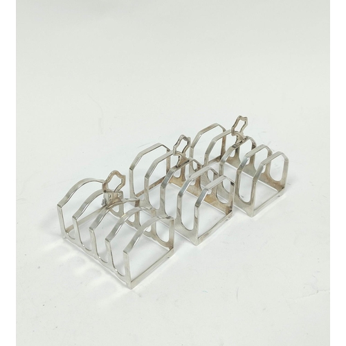 179 - Three silver individual toast racks and five condiments, approx. 280g / 9oz.