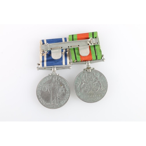 447 - Medals of Police Inspector John E Grey comprising a George VI Police long service and good conduct m... 