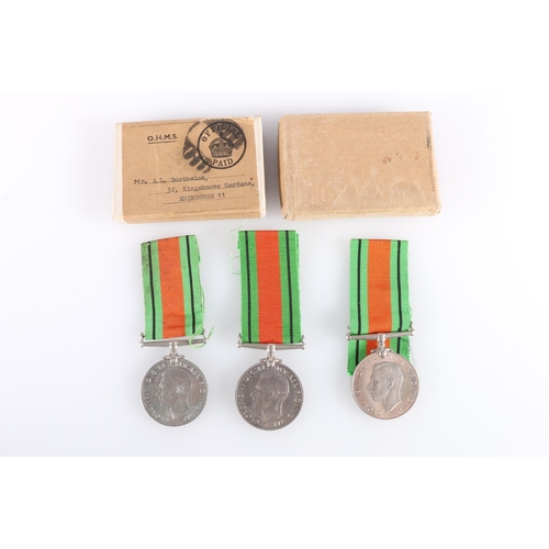 514 - WWII defence medal in issue box sent to Mr A L Borthwick, 32 Kingsknowe Gardens Edinburgh with Stars... 