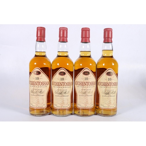 125 - Four bottles of AUCHENTOSHAN 10 year old Lowland single malt Scotch whisky, old style bottling,... 