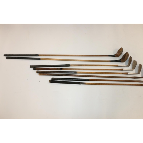 218 - Group of eight hickory shafted golf clubs to include The Albion mashie niblick, A Phimister of Grant... 