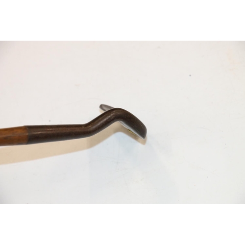 224 - Unusual stepped swan neck type hickory shafted golf club.