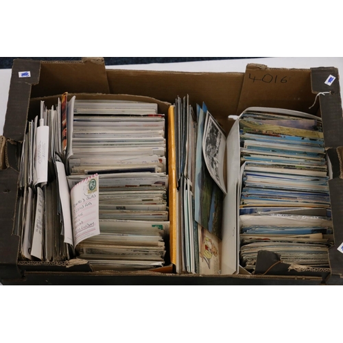 241 - Around 1000 postcards within a large cardboard box, predominantly colour cards including humorous ca... 