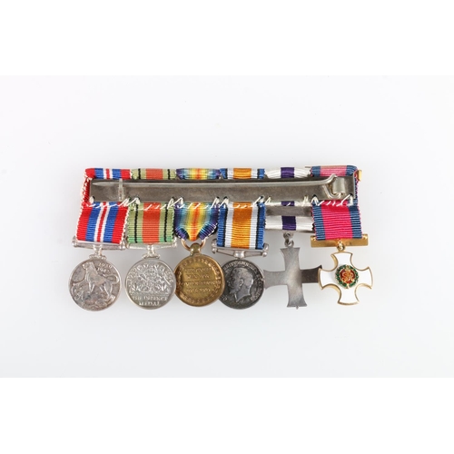 486 - WWI and WWII miniature medal group to include a Distinguished Service Order DSO, Military Cross with... 