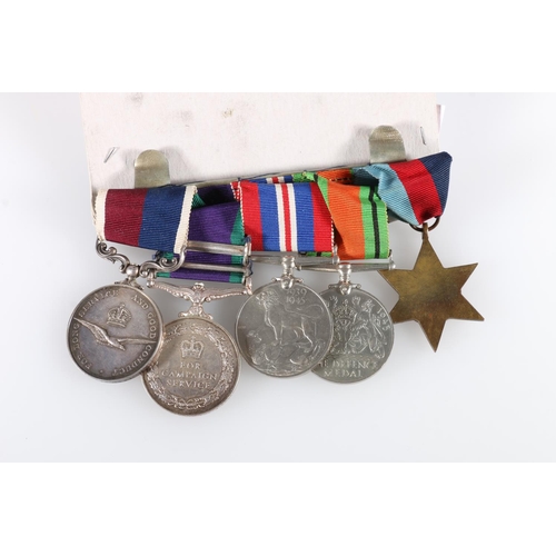 606 - Medals of 541593 Flight Sergeant G E Scutts of the Royal Air Force comprising Elizabeth II (DEI GRAT... 