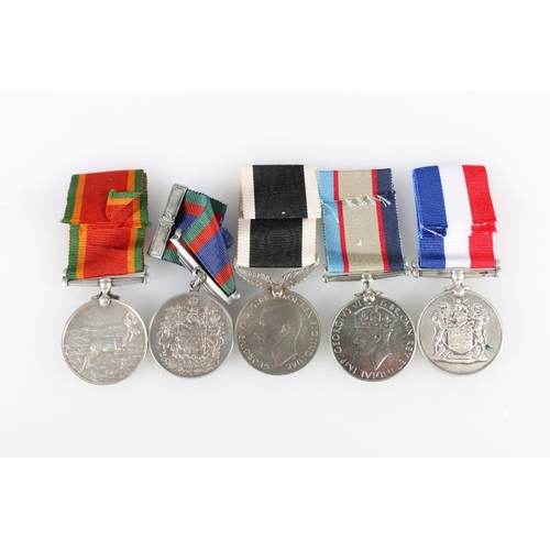 831 - WWII medals to include a Canadian Volunteer Service medal, Africa Service medal [329939 W H GUY], Au... 