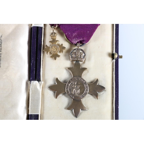 861 - MBE Member of the British Empire silver breast badge in fitted Garrard case, and an OBE Officer of t... 