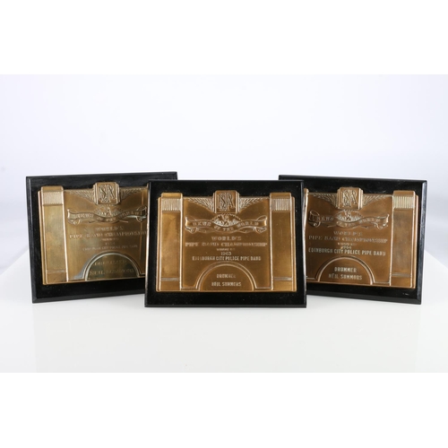 936 - Three News of the World Pipe Band Championship award plaques awarded to drummer Neil Summors of the ... 