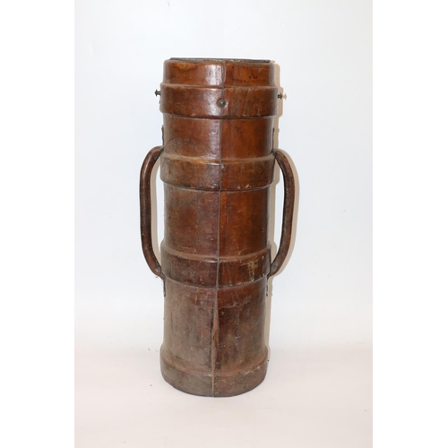 942 - Leather bound artillery shell carrier, the body marked with War Department arrow and RCD, 74cm tall....