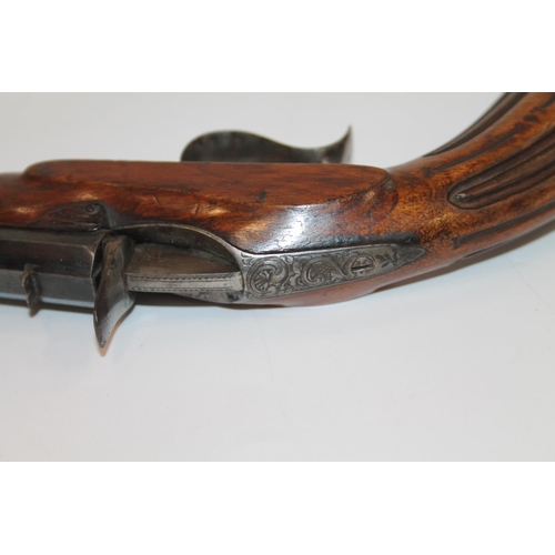 873 - 19th century French style percussion target pistol with 23cm long octagonal barrel, carved wood grip... 