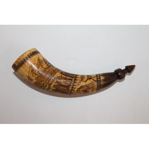 917 - A scrimshaw work powder horn with incised designs including Caerlaverock Castle, Lincluden Ruins, Bu... 