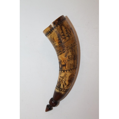 917 - A scrimshaw work powder horn with incised designs including Caerlaverock Castle, Lincluden Ruins, Bu... 