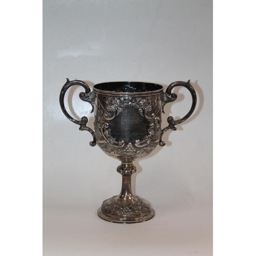 931 - Victorian silver trophy prize cup, the ornate Rococo style repousse body inscribed '5th Lancashire A... 