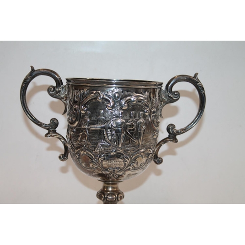 931 - Victorian silver trophy prize cup, the ornate Rococo style repousse body inscribed '5th Lancashire A... 