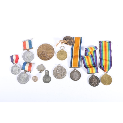 874 - Family medal grouping to include the medals of 3580 Private T McLaughlin of the Argyll and Sutherlan... 